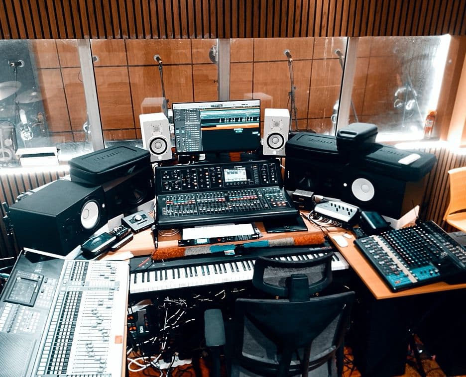 Production suite with console and monitors